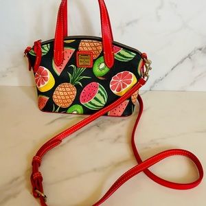 Dooney & Burke beautiful tropical print bag 9 inches X 10 inches with handle